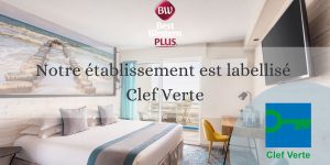 Hôtel écologique Clef Verte avec chambre moderne.